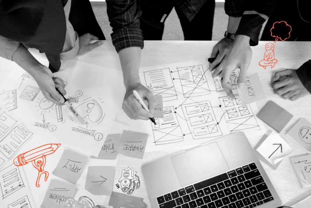 Personen planen und designen auf Papier